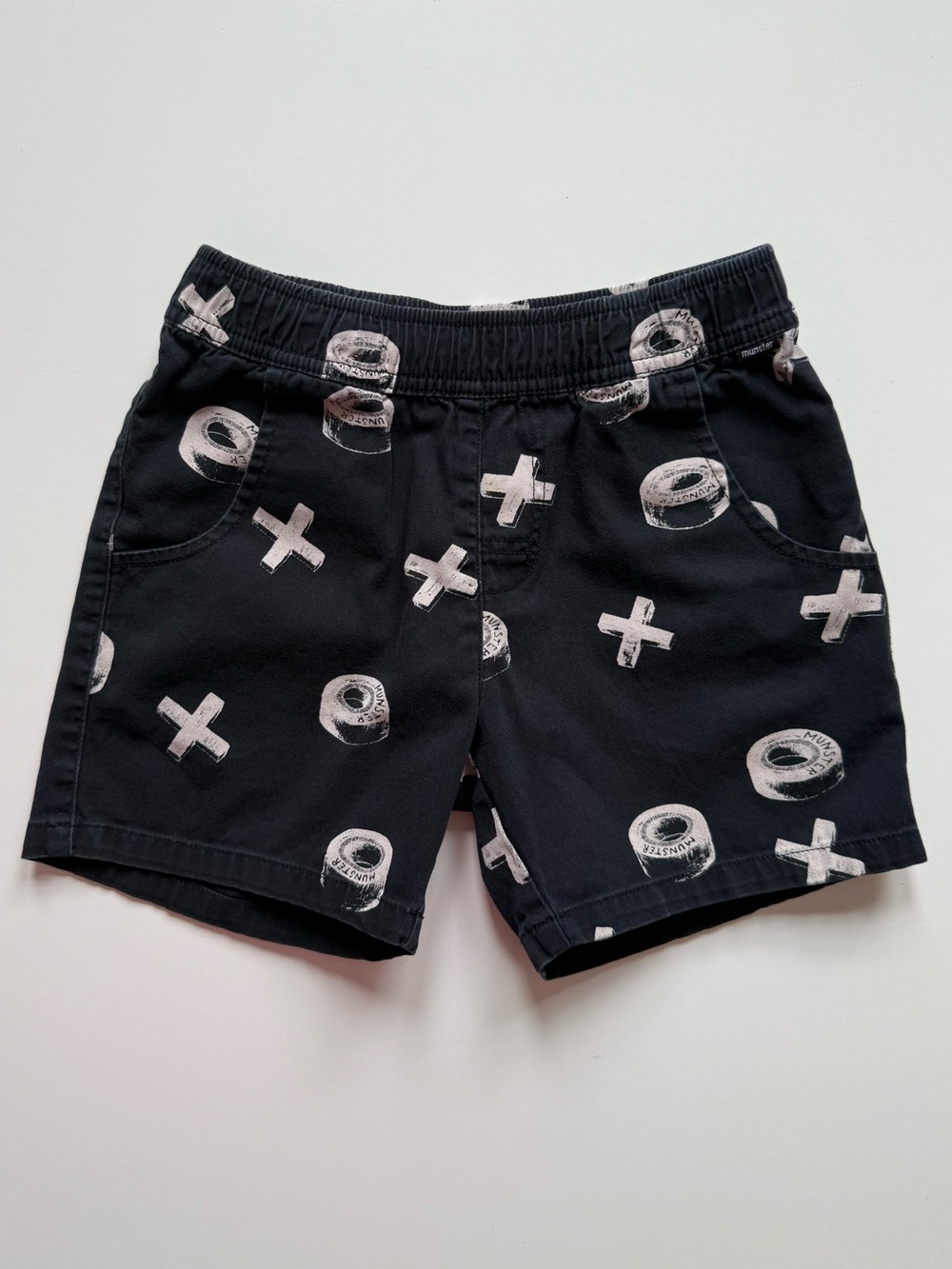 Munster Black Shorts with X’s & O’s Graphic Print - Size 6